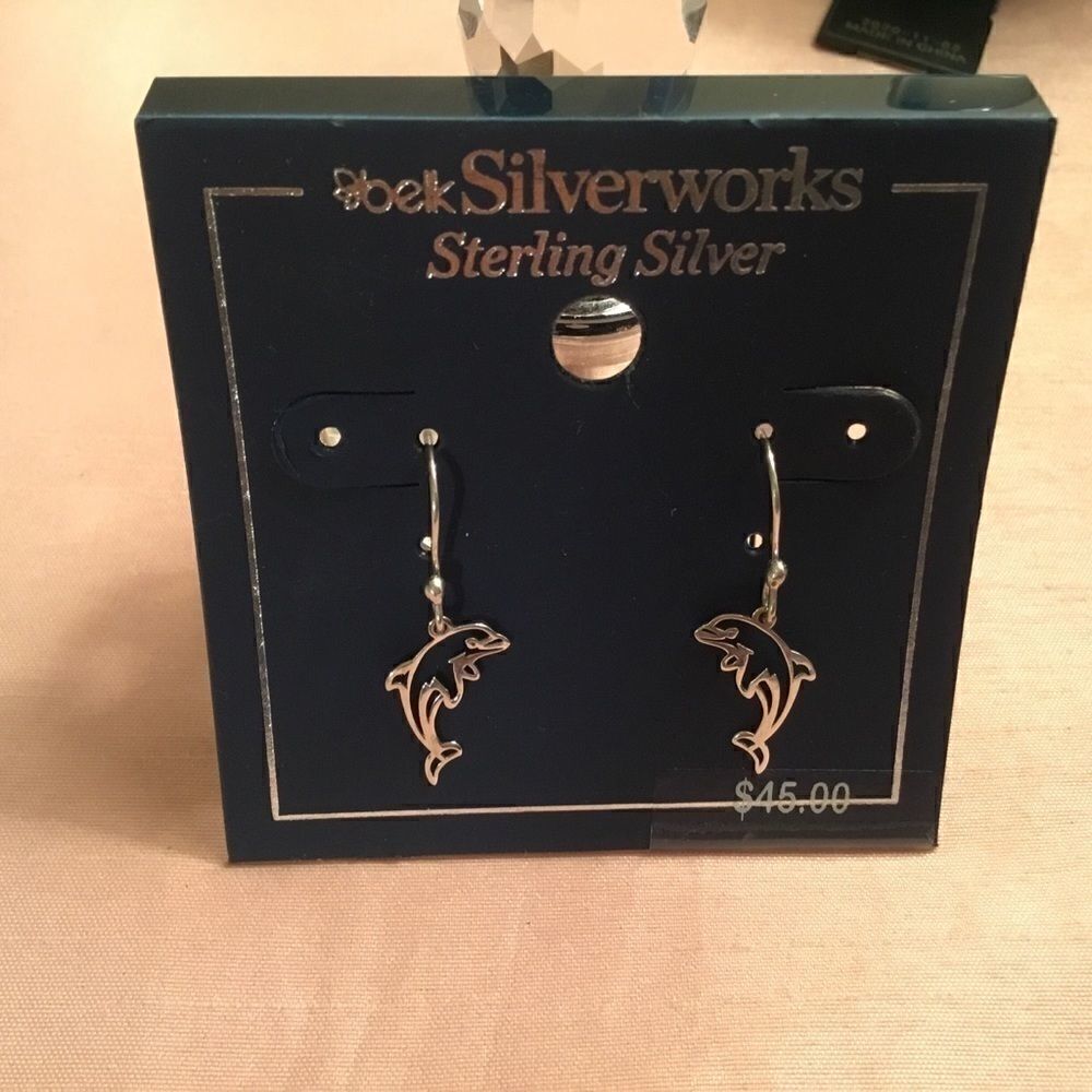 NWT. Sterling Silver Dolphin Earrings